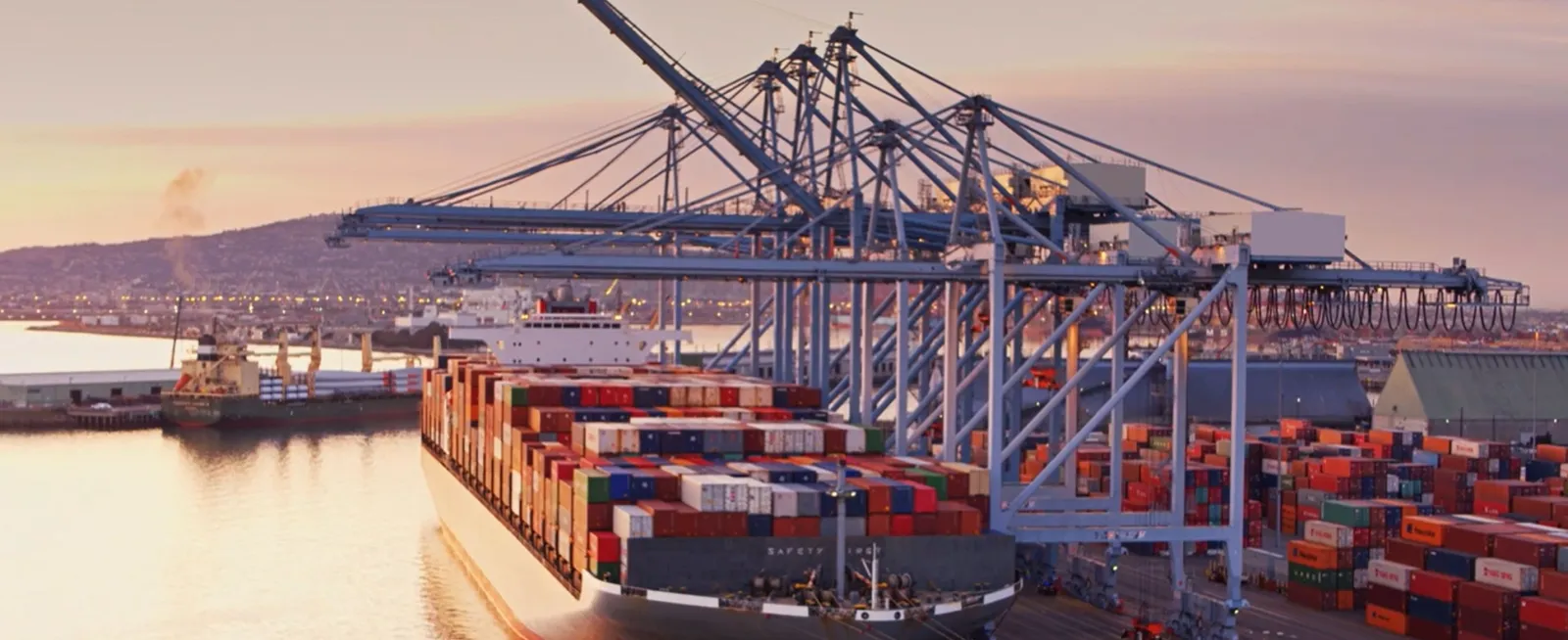 Barge with shipping containers